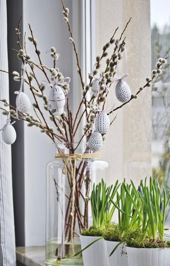 willow branches and black and white fake eggs are a cool decoration for spring and Easter, they will fit a Scandinavian space