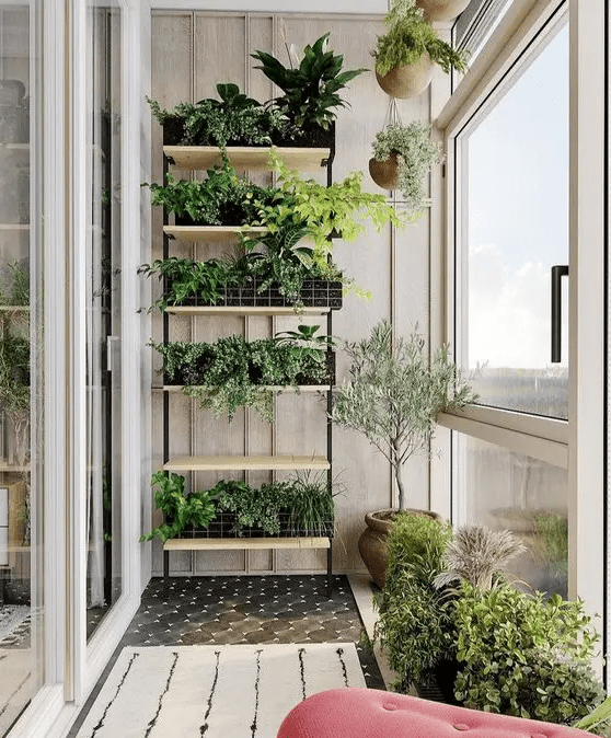 a small narrow shelving unit with planters and hanging ones are a great combo for a neutral balcony