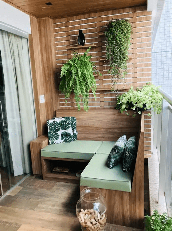 planks on the wall with shelves and planters attached are a cool solution for a modern and small balcony