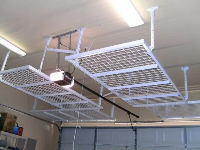 Ceiling mounted metal shelves for a basement