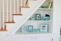 21 open shelving under the stairs