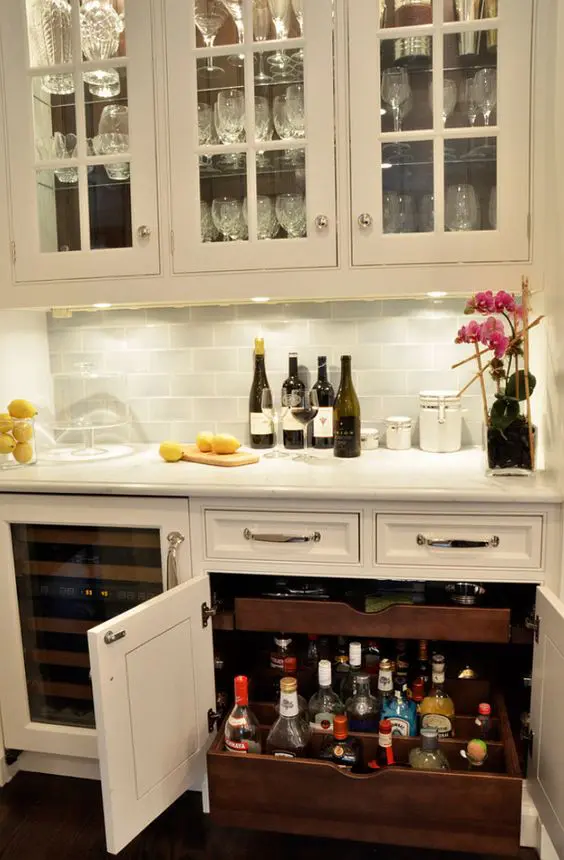 basement bar with custom pull-out drawers
