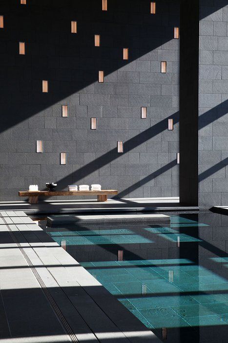 Spa like indoor pool with extensive glazing