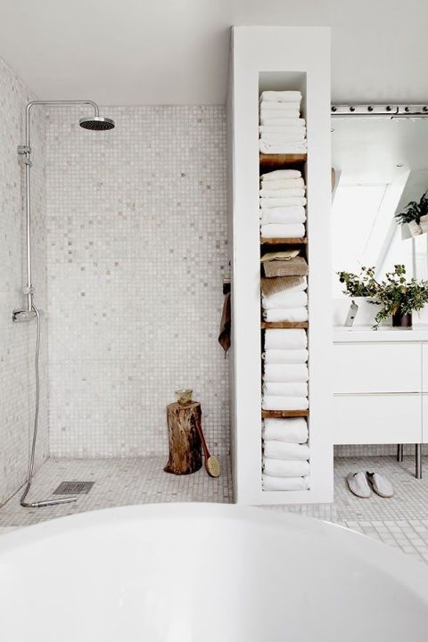 tiny white and silver shower tiles