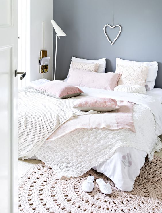 neutral bedding with blush touches