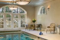 27 indoor pool with a tiled pattern on the bottom