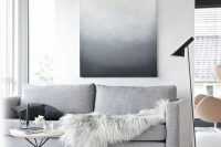 27 laconic Scandinavian room with just an oversized wall art