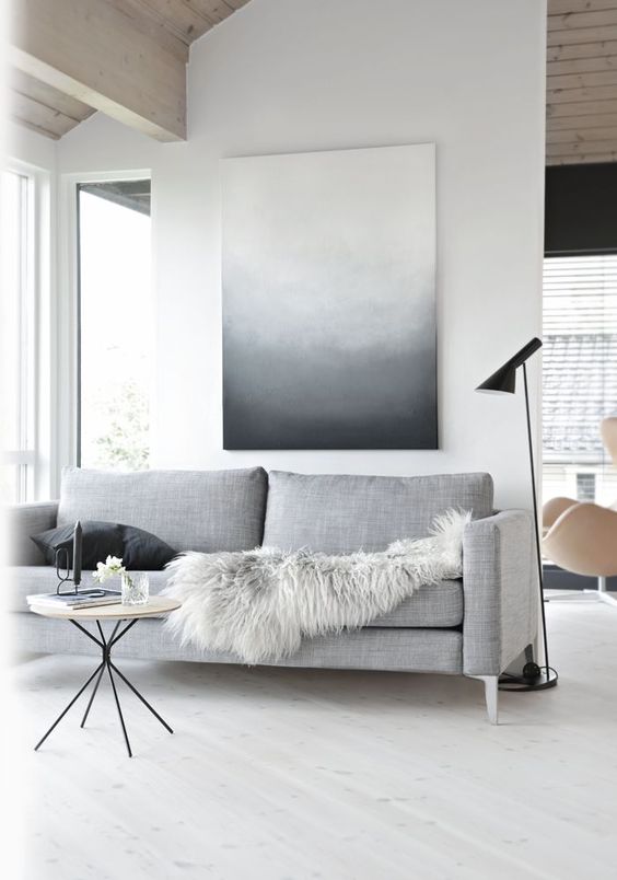 laconic Scandinavian room with just an oversized wall art