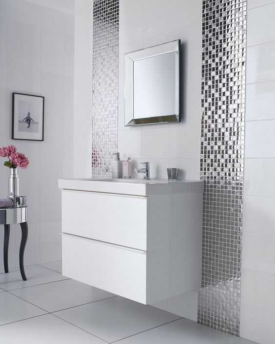 mirror mosaic tiles lines along the vanity