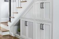 28 cabinets under the stairs