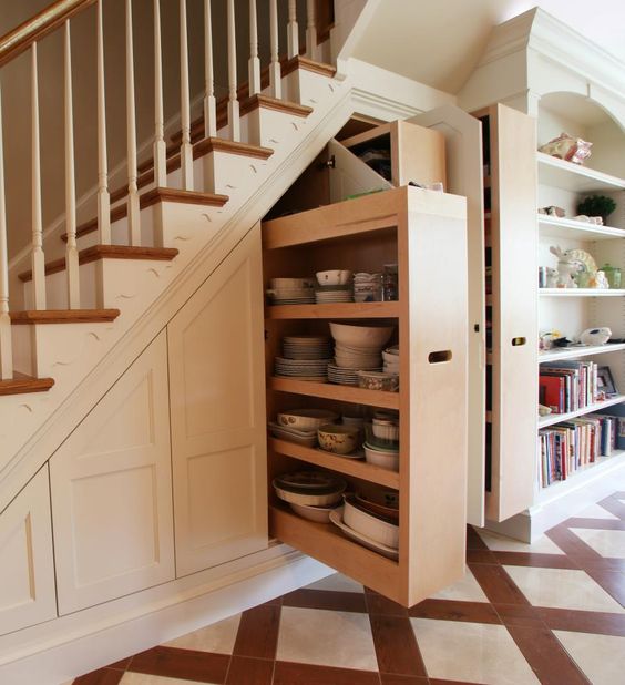 dishes and tableware storage under the stairs