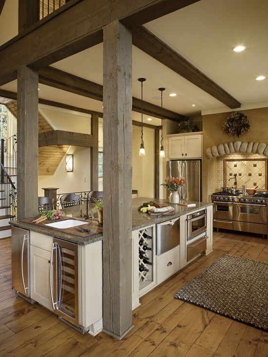 kitchen island with a fridge, cooler and oven