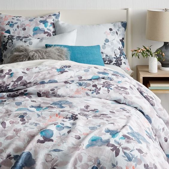 Watercolor is one of the huge trends popping up, and such bedding will set up a mood in the spring or summer