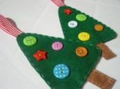 green felt Christmas ornaments with colorful buttons and red ribbons are lovely for decor and can be given as cute gifts, too