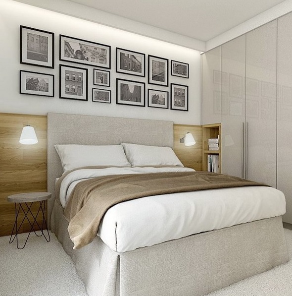An extended headboard and glossy doors of the wardrobe add space to this small room