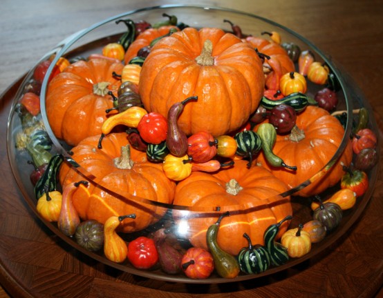 Super tiny faux pumpkins could become a part of a beautiful fall floating arrangement.