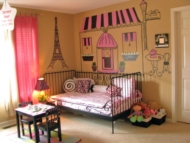 A cute Paris themed kid's room will be loved by most girls, I totally like wall art and a black forged bed that brings French chic