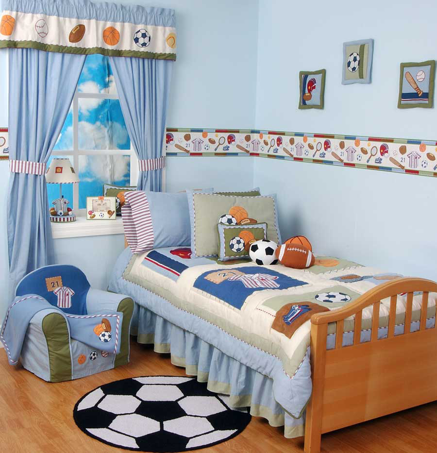 A football themed blue kid's room with various types of football balls and fun decor is ideal for boys