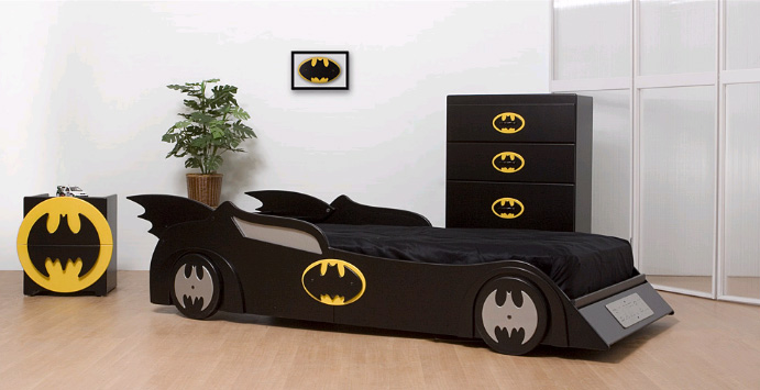 A Batman inspired room with a Batmobile bed, a bat dresser and a bat cabinet is a very edgy and bold idea