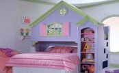 a cozy pastel house or castle-themed kid’s room with a lavender house bed, pink bedding and bright furniture