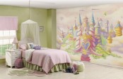a princess castle inspired room with a bright castle wall, a bed with pastel bedding and a canopy, green furniture
