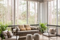 a handing daybed is a perfect furniture choice for a sunroom