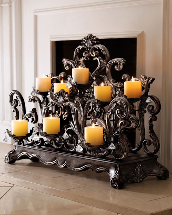 a chic and sophisticated candelabra with lots of candles will spruce up any fireplace giving it a more formal look