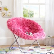 a cool hot pink faux fur chair is a lovely bright and glam piece to rock, it will add color and coziness to the space