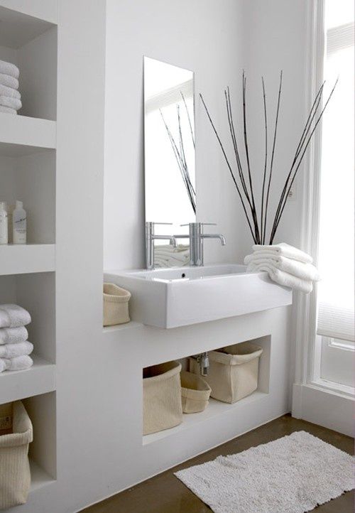 A built in niche shelf in the vanity is a lovely idea for a bathroom, it's a great way to store some stuff