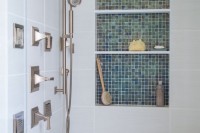 a simple neutral bathroom design with a niche