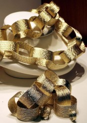 a gold chain garland will add shiny elegance to the space and will fit both Christmas and NYE decor
