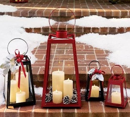 Arrange a grouping of festive lanterns at your front steps is a cool last minute holiday decoration idea.