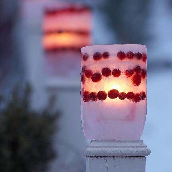 Frozen luminaries with little berries are perfect if you live in really cold region.