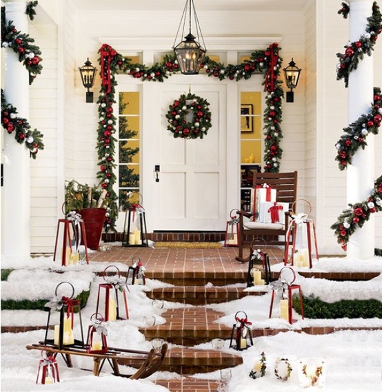Outlining a front door in garland is an easy way of welcoming the season. 