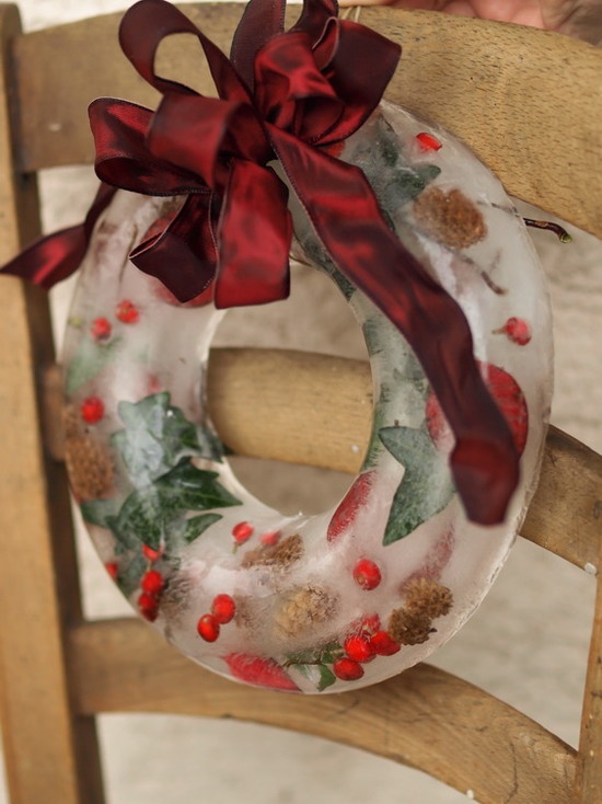 If it's really cold outside you can make a beautiful DIY wreath by simply frozing some seasonal things up.