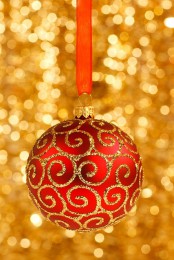 a red and gold Christmas ornament on red ribbon is always a good idea for chic and timeless Christmas decor