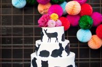 animal cake for a bold modern baby shower
