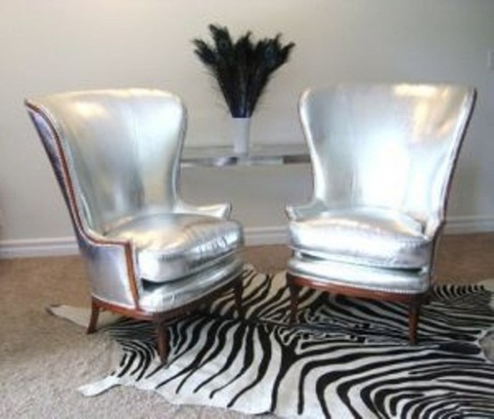 silver wingback chairs and a zebra print rug to make the spot bolder and cooler and give it a more eye-catchy look