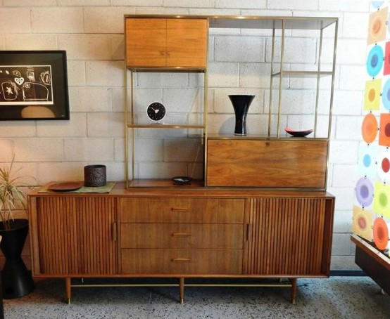 a catchy mid-century modern wall unit with cabinets and airy open shelves plus metallic touches