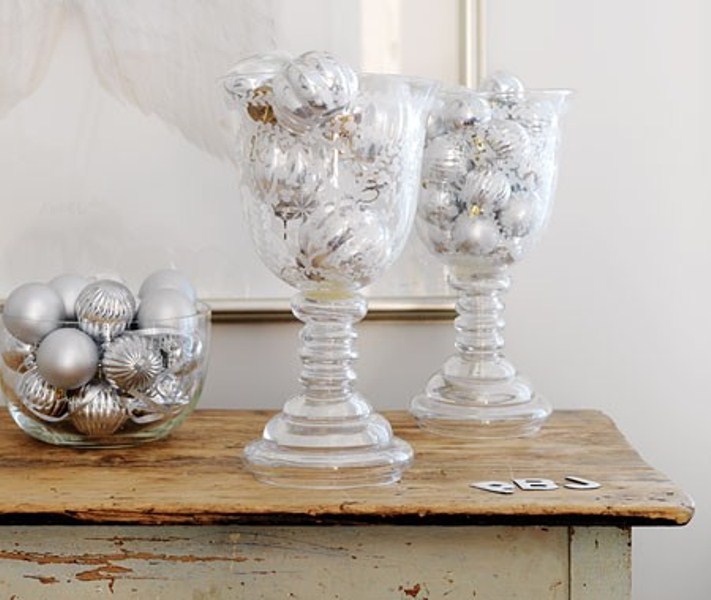 Frosted glass jars and a bowl with silver ornaments are nice to decorate tables, shelves, a mantel and other places