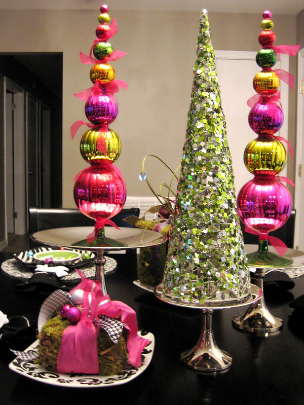Colorful Christmas ornament topiaries and a sparkling green sequin Christmas tree cone