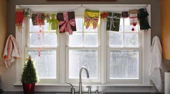 Make a garland of old Christmas presents and fix it on top of a window.