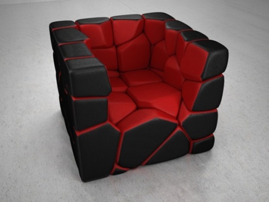 a black and red cube-shaped chair composed of pieces is a catchy idea for a modern and bold space, it will add both color and interest
