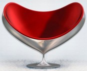 a beautiful and catchy silver heart chair with a red seat and a steel base is a unique solution to add love and cuteness to the space