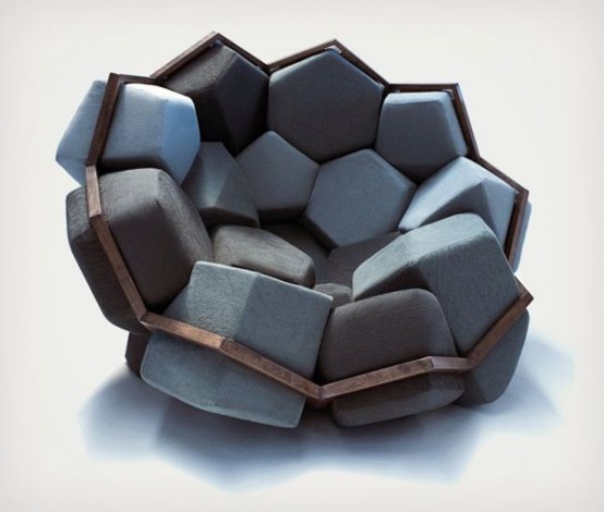 a bold modern chair that consists of a metal frame and grey and blue hexagons that are inserted in it is a very catchy and bold idea