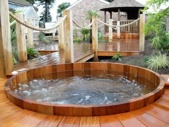 In-deck  hot tub design that's quite easy to access.