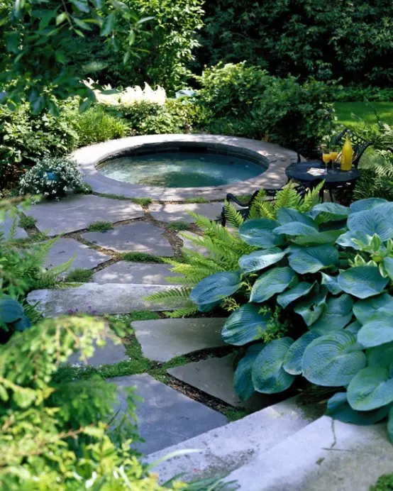 Another way to add some privacy to your hot tub is to surround it with plants.