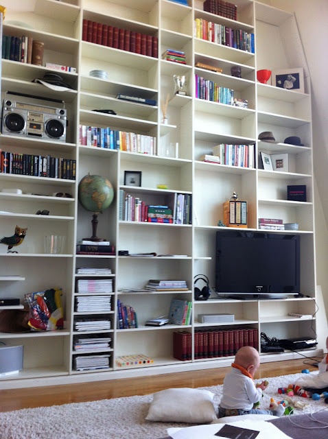 Building a really tall shelving system out of Billy bookcases is possible.