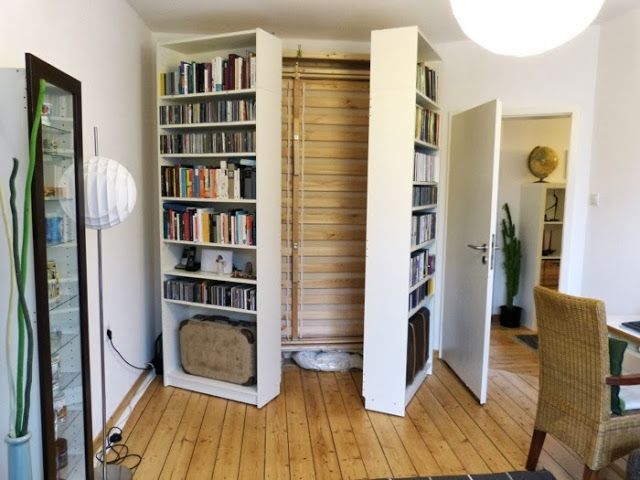 You can hide a murphy bed behind two bookcases.