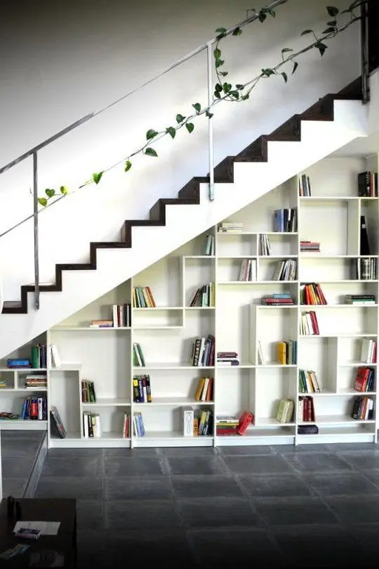You can turn it into a shelving unit into a smart under the stairs storage system.